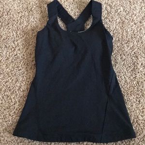 Black workout top with padded built in bra
